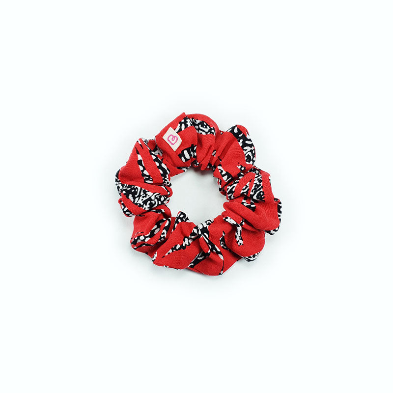 un chouchou pour cheveux Zèbre rouge de la marque Bunzelle en taille médium