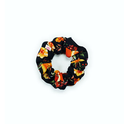 chouchou pour cheveux noir à fleurs rouges et orangées bouquet vintage de Bunzelle, en taille médium